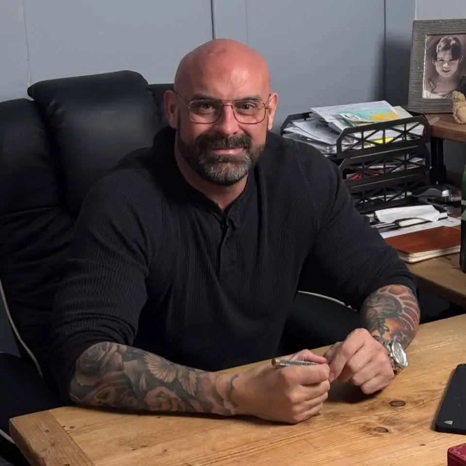 Calm Recovery founder Neil at his desk